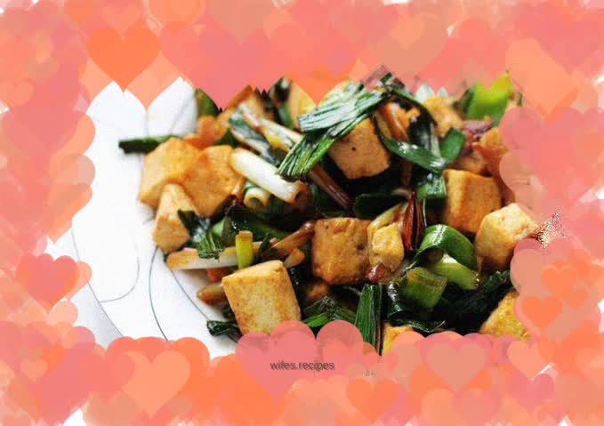 Stir-fried tofu with garlic sprouts