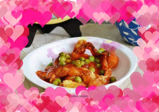 Grass carp with peas and tomato sauce