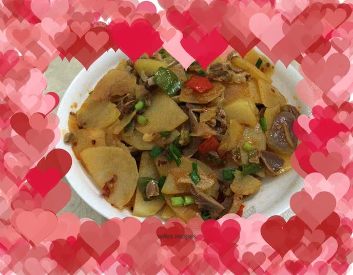 Side dish-fried chicken gizzards with potato slices