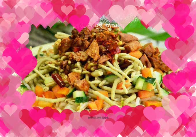 Sauce meat mixed with green wheat and rolled