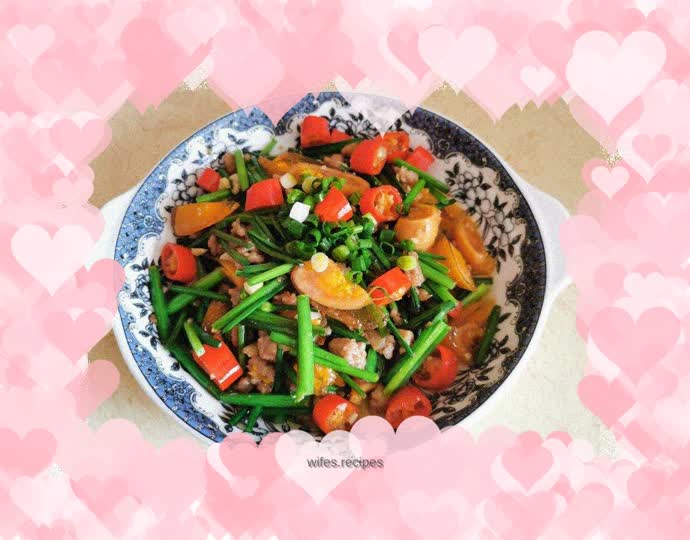 Stir-fried minced pork with preserved eggs and leek flowers