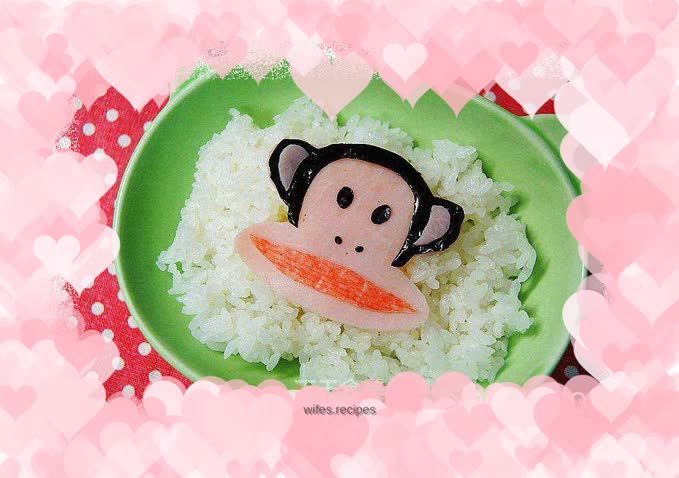 Big-mouthed monkey on white rice