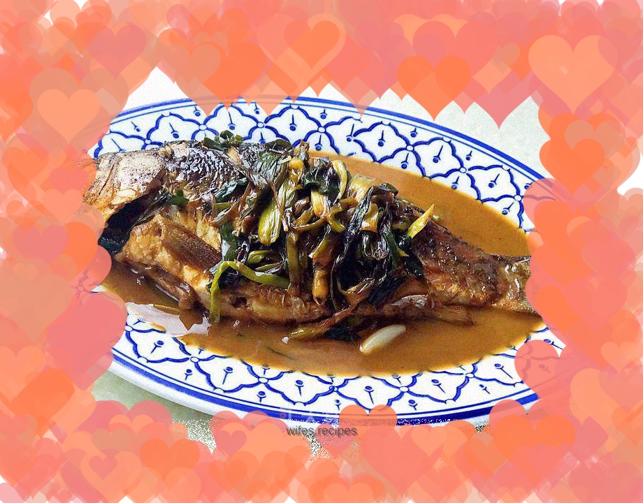 Braised crucian carp with green onions