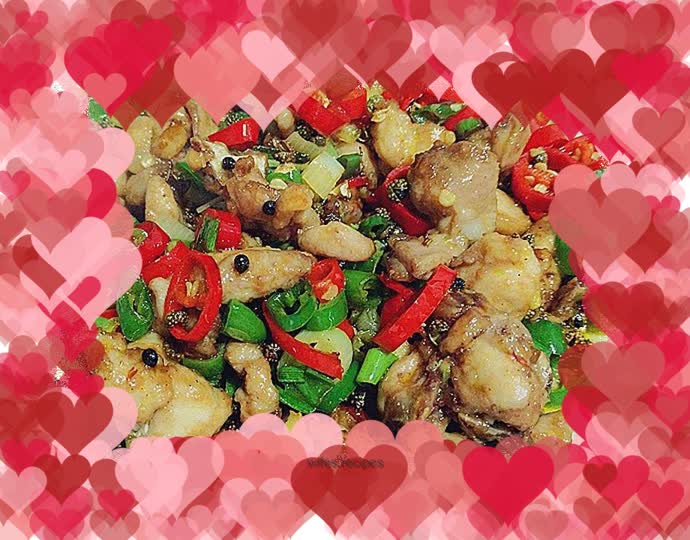 Rabbit cubes with pepper and sesame seeds