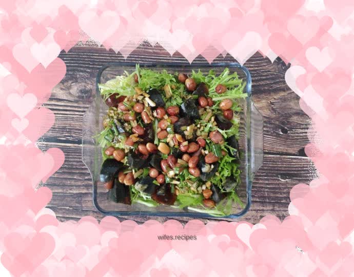 Preserved egg and peanuts mixed with bitter chrysanthemum