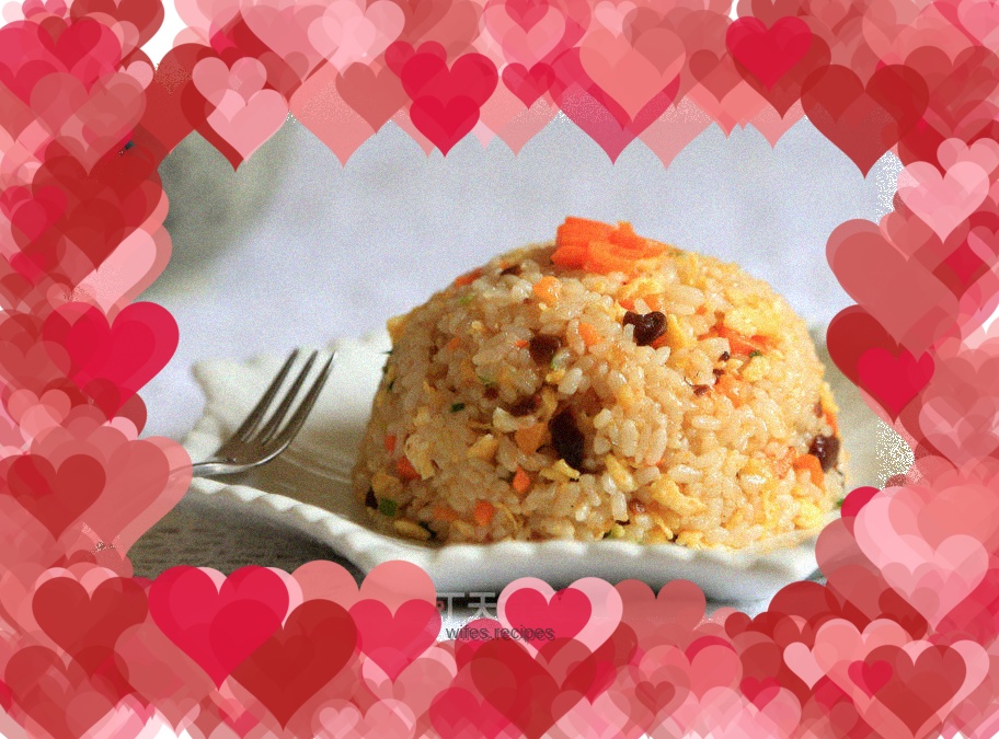 Fried rice with carrot and egg in sea cucumber sauce