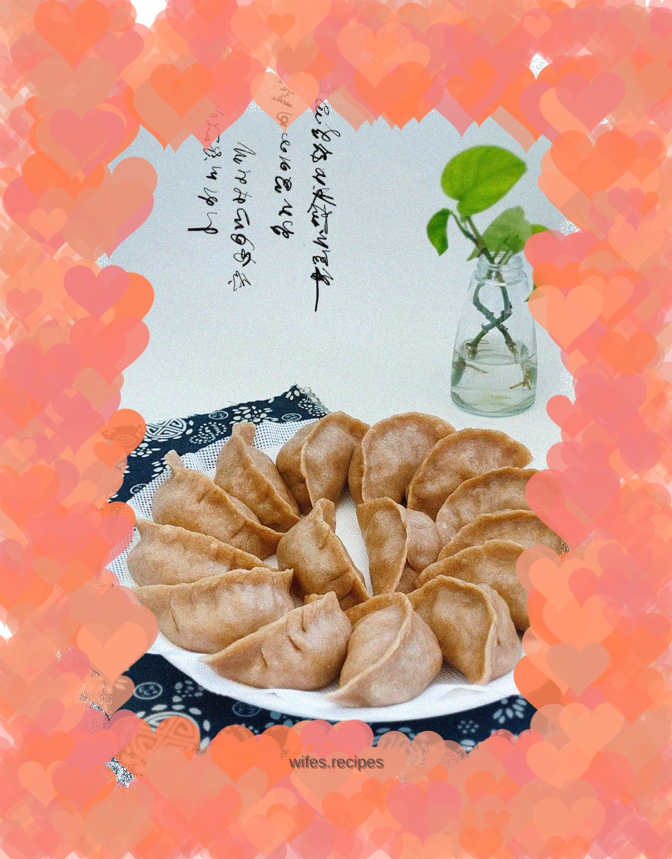 Steamed dumplings with whole wheat noodles, fresh meat and cabbage