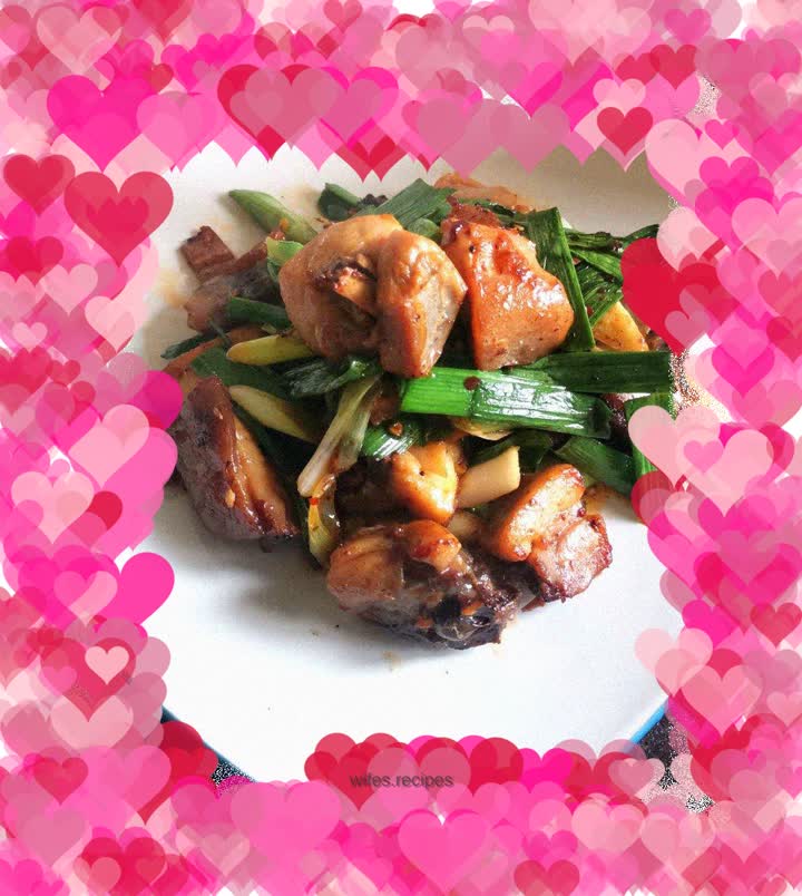 Stir-fried chicken legs with garlic sprouts