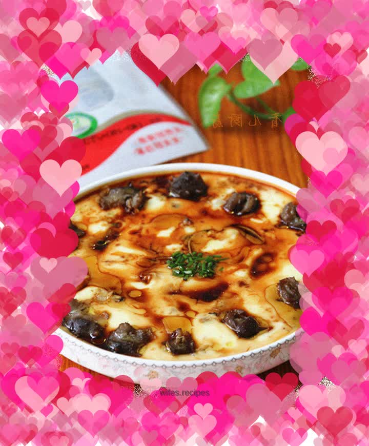 Stewed eggs with sea cucumber and clams