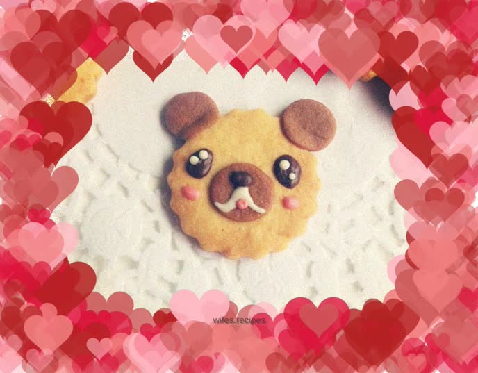 Staring with big watery eyes to look cute - Coconut bear biscuits