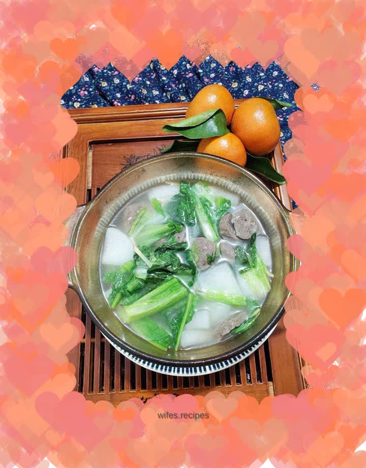 Beef meatball soup with radish, greens and vegetables