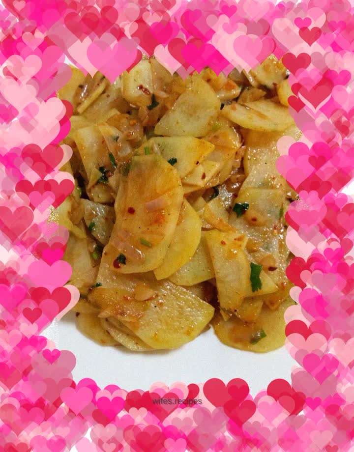 Fried potato slices with onions