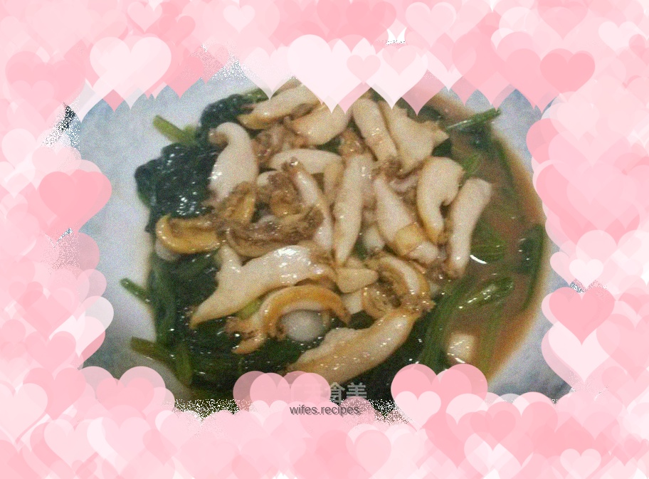 Braised abalone slices in garlic and oyster sauce with spinach
