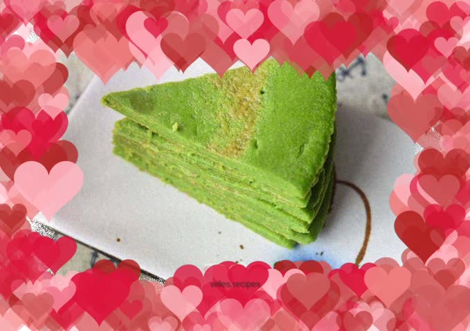 Pancakes with spinach sauce