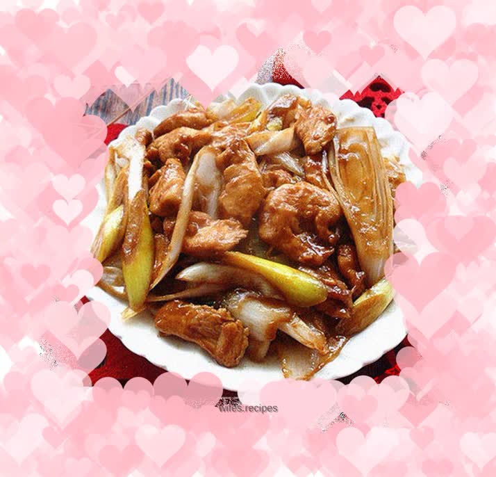 Quick stir-fry - fried chicken slices with green onions