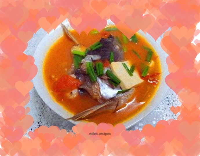 Tomato fish head and tofu soup