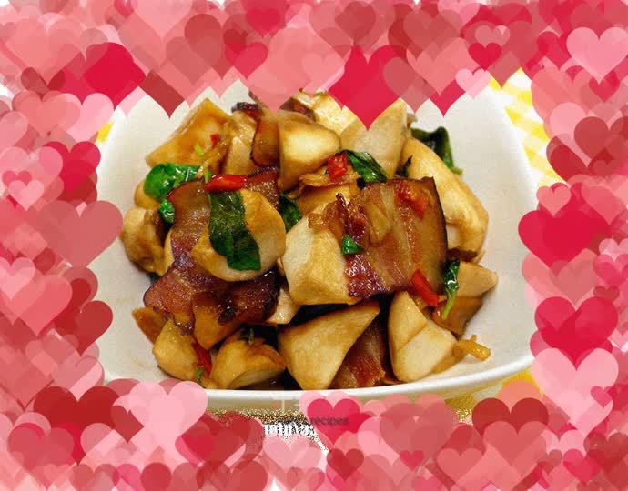 Stir-fried king oyster mushrooms in nine-layer pagoda with cured meat