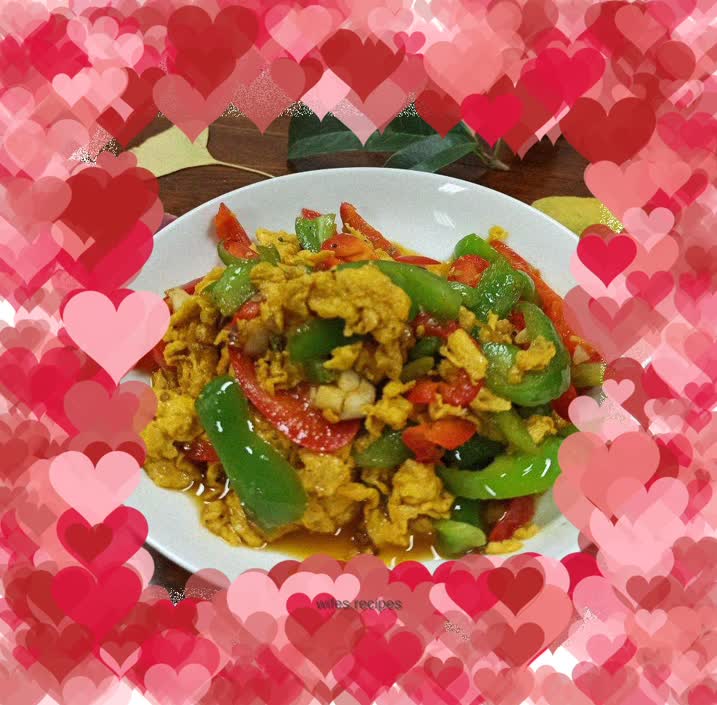 Scrambled eggs with colored peppers