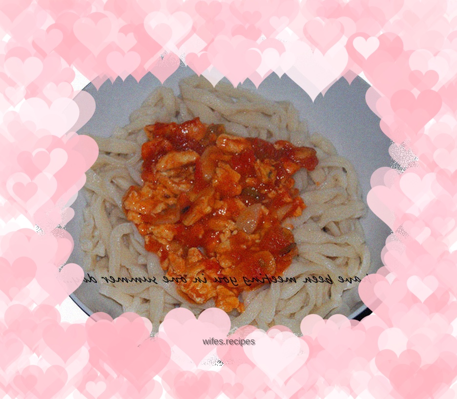 Hand-made noodles with tomatoes and eggs