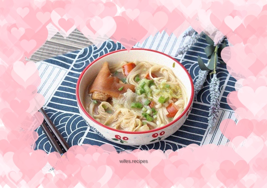 Pork trotters pierced through sausage noodles