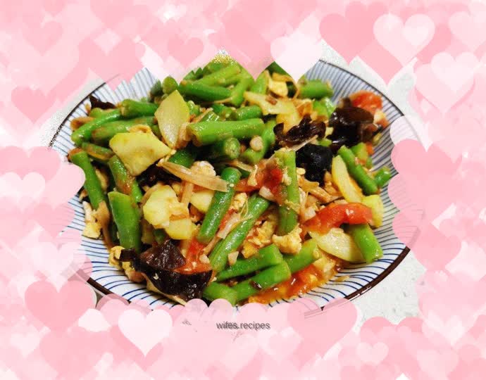 Fried beans with eggs, tomatoes