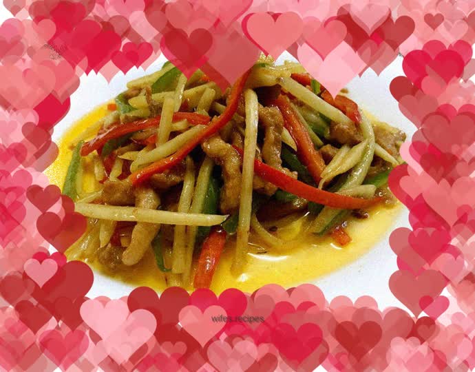 Shredded pork with green and red pepper seeds and ginger