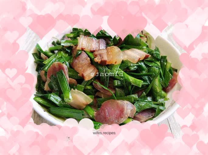 Fried garlic sprouts with cured meat