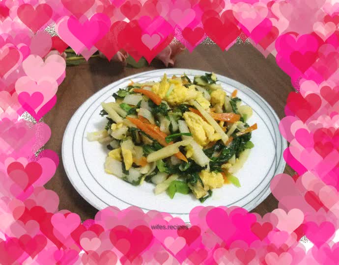 Stir-fried rice cake with winter bamboo shoots, mustard greens and duck egg