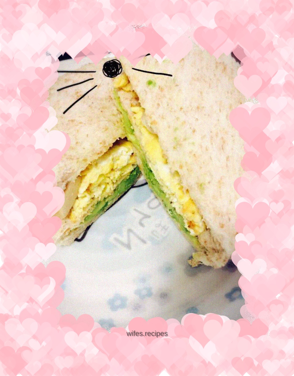 Avocado, egg and fish sausage sandwich