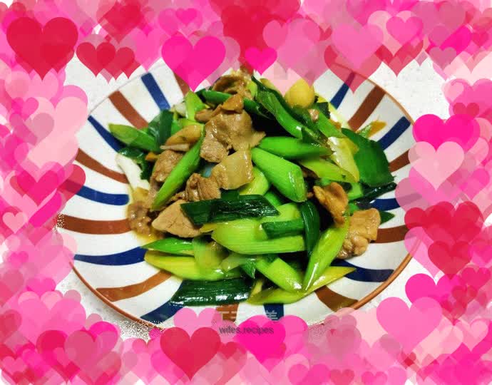 Stir-fried pork belly with green garlic sprouts