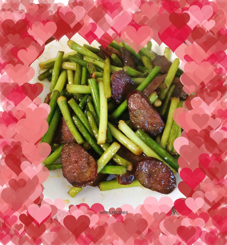 Stir-fried sausage with garlic sprouts