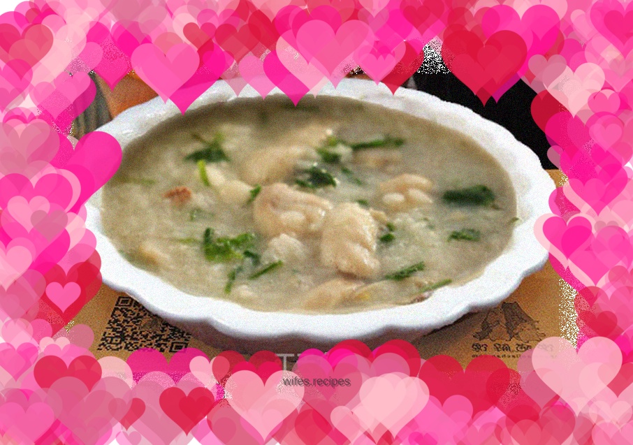 Healthy porridge with raw red lucky fish slices