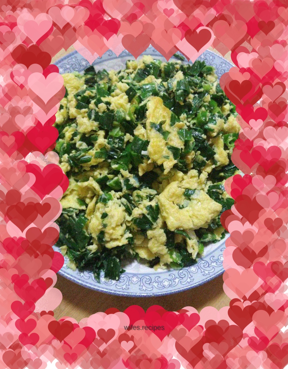 Fried goose egg with garlic sprouts